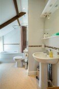 Spacious bathroom with bath